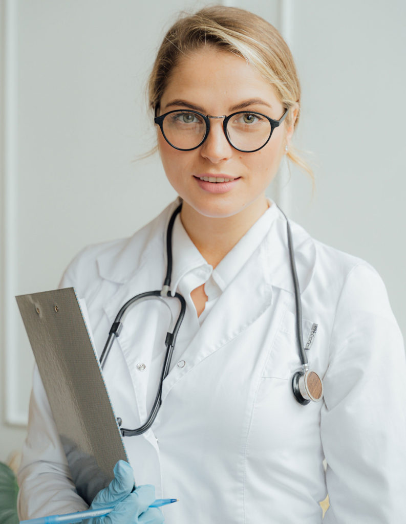 medical digital marketing woman doctor in glasses with documents